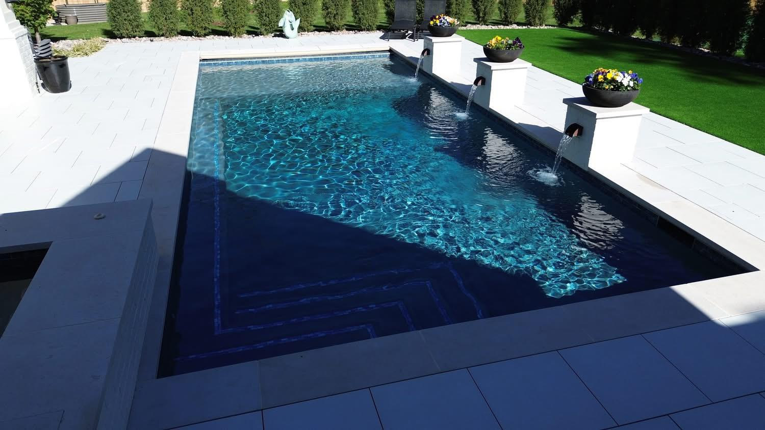Custom pool by Proper Pools and Spas