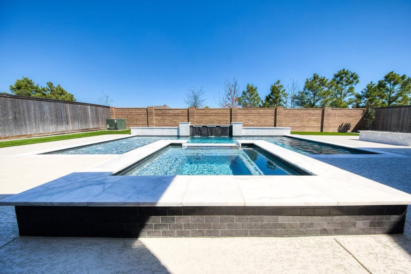 Custom spa by Proper Pools and Spas